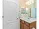 Small bathroom with vanity and single sink at 6139 Grand Cypress Blvd, North Port, FL 34287