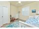 Bedroom with daybed, rocking chair, and closet at 6139 Grand Cypress Blvd, North Port, FL 34287