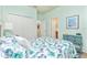 Bedroom with double bed, dresser, and closet at 6139 Grand Cypress Blvd, North Port, FL 34287