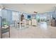 Dining area with a light gray table and coastal decor at 6139 Grand Cypress Blvd, North Port, FL 34287