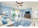 Relaxing living room with sliding glass doors leading to a backyard patio at 6139 Grand Cypress Blvd, North Port, FL 34287