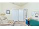 Home office with desk, chair, and built-in shelves at 6139 Grand Cypress Blvd, North Port, FL 34287