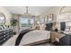Bright bedroom featuring a king-size bed and natural light at 9578 Turtle Grass Cir, Punta Gorda, FL 33950