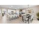 Open concept kitchen with an island and breakfast bar at 9578 Turtle Grass Cir, Punta Gorda, FL 33950