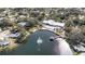 Aerial view showing community pool, lake, and tennis courts at 10810 Cedar Breaks Dr, Port Richey, FL 34668