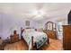 Main bedroom with wood furniture and ceiling fan at 10810 Cedar Breaks Dr, Port Richey, FL 34668