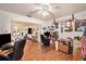 Home office features built-in shelving and hardwood floors at 10810 Cedar Breaks Dr, Port Richey, FL 34668