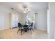 Dining area with four chairs and a glass-top dining table at 11346 Laffite Pl, Port Charlotte, FL 33981