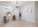 Dining area with wood-look floors and a bay window at 11346 Laffite Pl, Port Charlotte, FL 33981