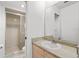 Updated bathroom with a shower/tub combo and vanity at 1217 Aqui Esta Dr # 5, Punta Gorda, FL 33950