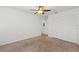 Spacious bedroom with ceiling fan and double door closet at 1217 Aqui Esta Dr # 5, Punta Gorda, FL 33950