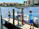 Private dock perfect for fishing and enjoying the waterfront lifestyle at 1217 Aqui Esta Dr # 5, Punta Gorda, FL 33950