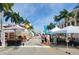 Outdoor market with various vendors and goods for sale at 1217 Aqui Esta Dr # 5, Punta Gorda, FL 33950