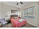 Bedroom with a pineapple patterned comforter and wicker headboard at 13264 Creekside Ln, Port Charlotte, FL 33953