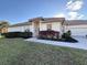 House exterior showcasing walkway and landscaping at 13264 Creekside Ln, Port Charlotte, FL 33953