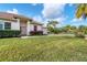 Well-maintained lawn, entryway and landscaping at 13264 Creekside Ln, Port Charlotte, FL 33953