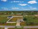 Aerial view of a single Gathering home and surrounding lots at 13536 Ainsworth Ln, Port Charlotte, FL 33981