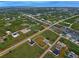 Wide aerial view of the neighborhood and surrounding area at 13536 Ainsworth Ln, Port Charlotte, FL 33981