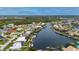 Aerial view of canal front home with pool and boat dock at 1431 Grebe Dr, Punta Gorda, FL 33950