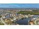 Aerial view of waterfront home, highlighting its location on the canal at 1431 Grebe Dr, Punta Gorda, FL 33950