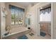 Relaxing bathroom with soaking tub and access to a toilet room at 1431 Grebe Dr, Punta Gorda, FL 33950