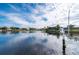 Calm water canal view with neighboring houses at 1431 Grebe Dr, Punta Gorda, FL 33950