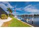 Private dock with boat lift, offering stunning canal and neighborhood views at 1431 Grebe Dr, Punta Gorda, FL 33950