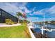 Private dock with boat lift, offering stunning canal and neighborhood views at 1431 Grebe Dr, Punta Gorda, FL 33950