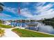 Private dock with boat lift on a canal at 1431 Grebe Dr, Punta Gorda, FL 33950