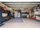 Spacious garage with ample storage and workshop area at 1431 Grebe Dr, Punta Gorda, FL 33950