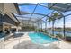 Enclosed pool and patio area with canal view at 1431 Grebe Dr, Punta Gorda, FL 33950