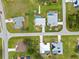 Aerial view showing home's location, pool, and landscaping at 157 Valdiva St, Punta Gorda, FL 33983