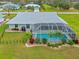 Aerial view of the house and the pool area at 157 Valdiva St, Punta Gorda, FL 33983