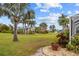 Spacious backyard with lush landscaping at 157 Valdiva St, Punta Gorda, FL 33983