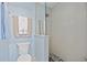 Bathroom with a walk-in shower and toilet at 157 Valdiva St, Punta Gorda, FL 33983