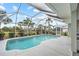 Enjoy this refreshing pool with a screened enclosure at 157 Valdiva St, Punta Gorda, FL 33983