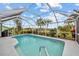 Inviting screened pool with ample deck space at 157 Valdiva St, Punta Gorda, FL 33983