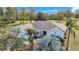 Single-story home with a large yard, seen from an aerial perspective at 16161 Juarez Cir, Punta Gorda, FL 33955