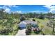 Aerial view of a single-Gathering house with a large yard at 16161 Juarez Cir, Punta Gorda, FL 33955