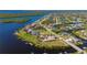 Waterfront community with lush landscaping and canals at 17557 Ohara Dr, Port Charlotte, FL 33948