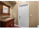 Elegant bathroom with granite vanity and hardwood floor at 17557 Ohara Dr, Port Charlotte, FL 33948