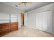 Bedroom with built-in shelving and a ceiling fan at 17557 Ohara Dr, Port Charlotte, FL 33948