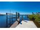 Spacious private dock with boat lift and water access at 17557 Ohara Dr, Port Charlotte, FL 33948