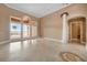 Living room with high ceilings, a view of the pool, and marble floors at 17557 Ohara Dr, Port Charlotte, FL 33948