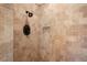 Walk-in shower with neutral tile and modern fixtures at 17557 Ohara Dr, Port Charlotte, FL 33948