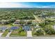 Aerial view showcasing the home's expansive lot and surrounding neighborhood at 1763 Oakland Rd, North Port, FL 34286