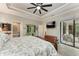 Main bedroom with access to bathroom and backyard at 1763 Oakland Rd, North Port, FL 34286