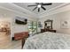 Main bedroom with sliding glass doors to backyard at 1763 Oakland Rd, North Port, FL 34286