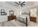 Spacious main bedroom with wood flooring and large windows at 1763 Oakland Rd, North Port, FL 34286