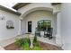 Inviting front porch with rocking chairs and decorative accents at 1763 Oakland Rd, North Port, FL 34286